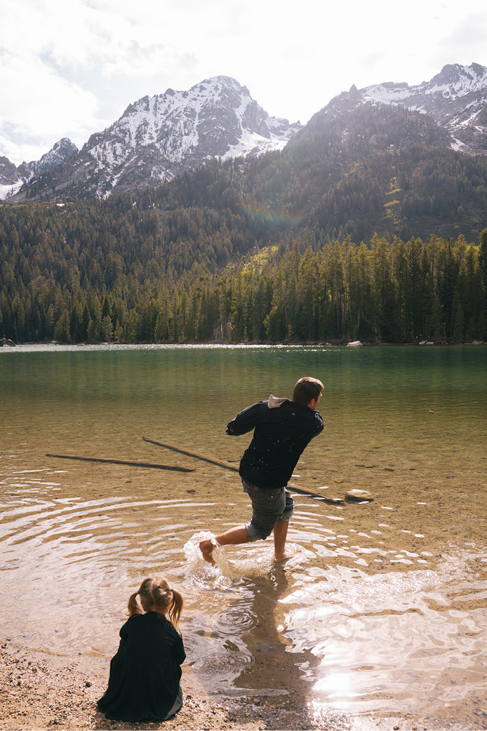 Dad skipping rocks on String Lake, GTNP
